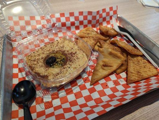 Spicy hummus and freshly fried pita chips