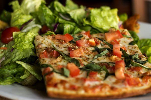 Slice and a Salad for just $6.95 during lunch time and Fire Hours!