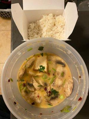 Tom Kha with fried tofu and a side of rice! Packed with mushrooms and lots of flavor! Not overly sweet or sour.