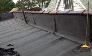 new roof installed, rubberized parapet wall