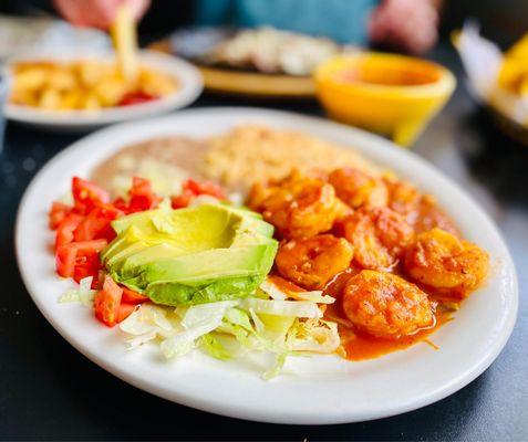 A whole avocado salad comes With the shrimp diablo rice & beans & Tortillas! Fabulous! Get it! :)...