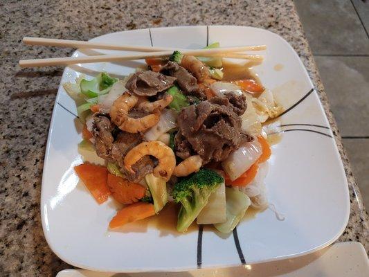 Beef & shrimp and vegetables over noodles