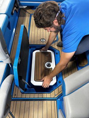 Charlie showing me the features of the nautique boat