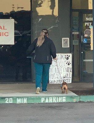 The vet walking my dog inside