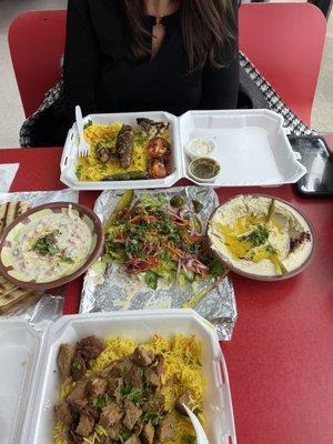 Big spread.  Two entrées with sides.  Hummus, yogurt salad dressing, chicken and gyro meat.