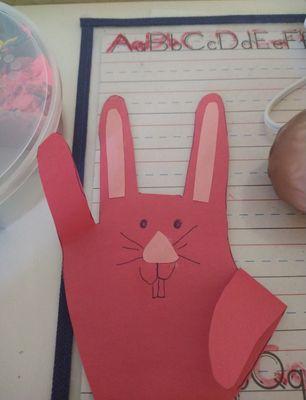 We do daily arts and crafts for the kiddos too!. Here is an example of one of are hand bunnies.