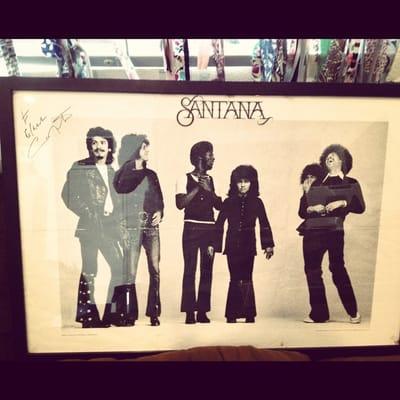 Carlos Santana signed vintage poster. Art framed it with such care! Looks so good in my house!