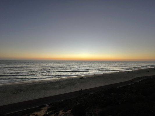 Just after the sunset, people flee the beach.