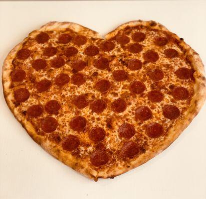 Heart shape pizza  order it for your love. But first, love yourself