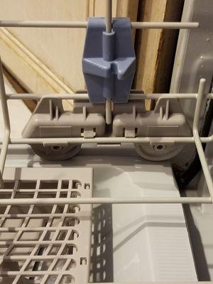 This is the blue plastic thingy on my dishwasher that was broken.