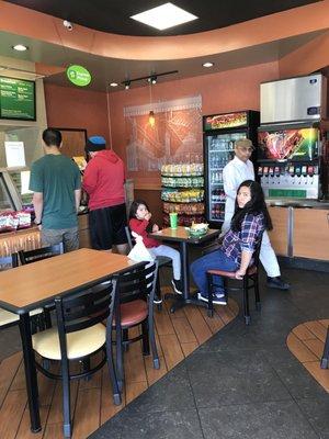 Manager walking past the soda machine.