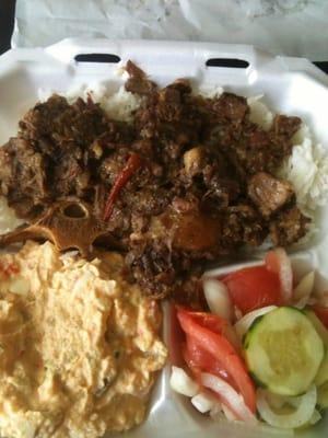 This was the delicious homemade lunch of oxtail stew with potato salad and cucumber and tomato salad- a very generous portion!