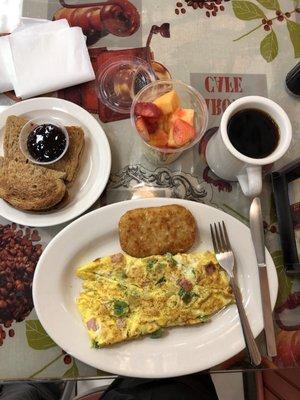 A great way to start the day.  Western omelette, fruit cup, whole wheat toast with grape jelly and coffee.