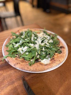 mushroom pizza? It's somewhere under all that arugula.