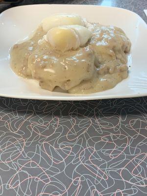 Kinda ugly poached egg on shiny gravy.