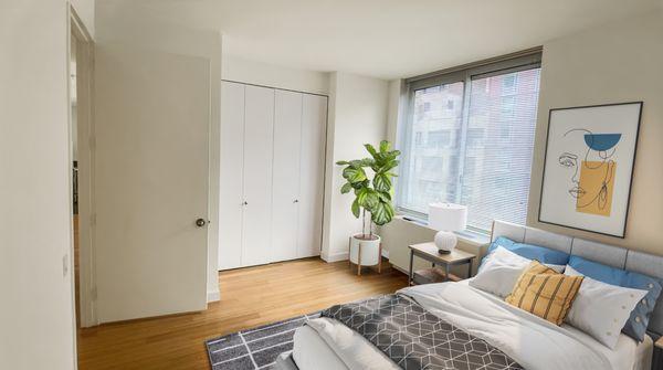 A bedroom in a luxury NYC apartment at Emerald Green in Midtown West Manhattan