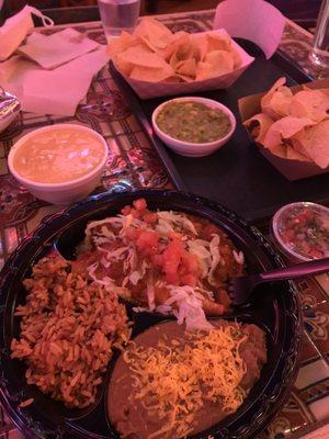 Chicken Enchilada plate, Chile Con Queso Dip & Chips, Guacamole & Chips