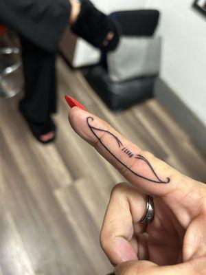 Finger tattoo