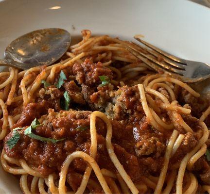 Spaghetti with a big meatball. Delicious!