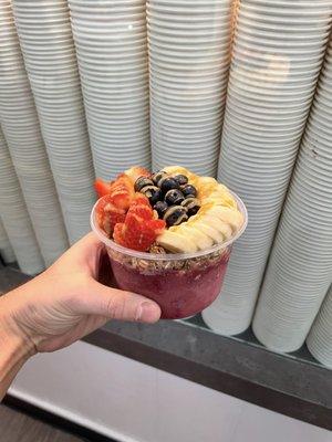 Brazilian Acai Bowl with banana, strawberry, blueberry and peanut butter toppings