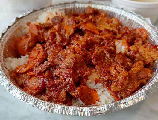 Spicy pork over rice