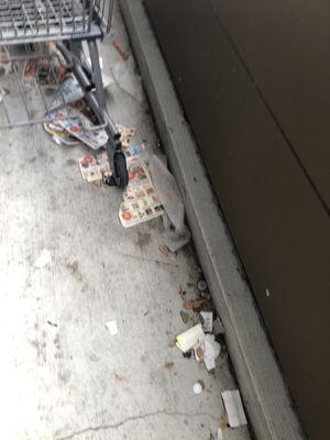 Paper   Trash out side. Come on guys clean up