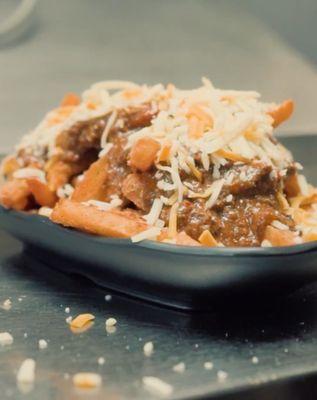 Chef Soulo's Oxtail Chili Cheese Fries