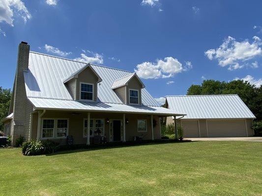 New metal roof, siding, and paint