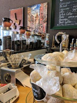 Counter w Turkish pastries, organic oat bites, and all of their fresh coffee on display.