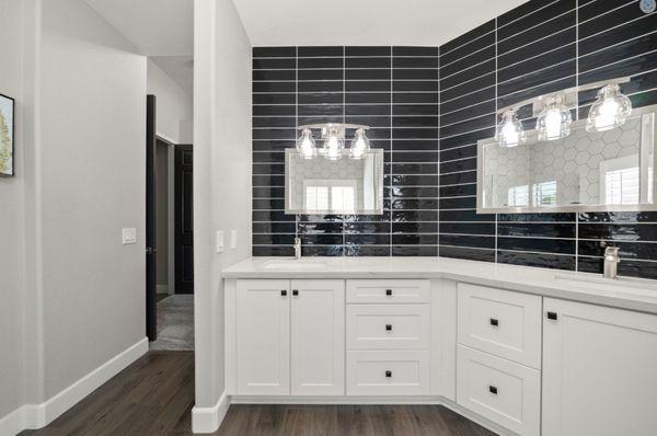 custom bathroom shaker cabinets with black subway tile