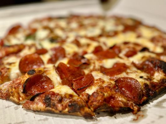 Half pepperoni, half spinach and roasted red pepper.