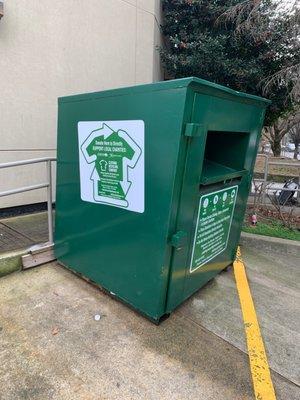 Local clothing donation bin on site to the right of the tiger mart