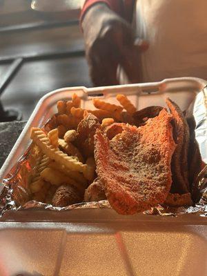 Flounder plate with hushpuppies and fries