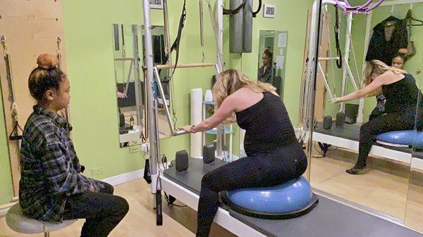 Prenatal pilates on the reformer