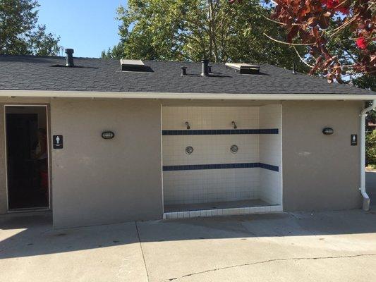 Showers, bathrooms and office entrance.