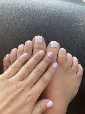 Pink gel manicure, white pedicure = $73