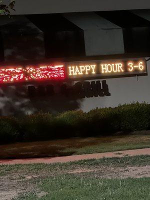 The sign that does not specify Wednesday only for happy hour!