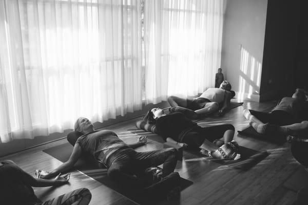 Restorative Yoga class at COIL Yoga in the Solar room