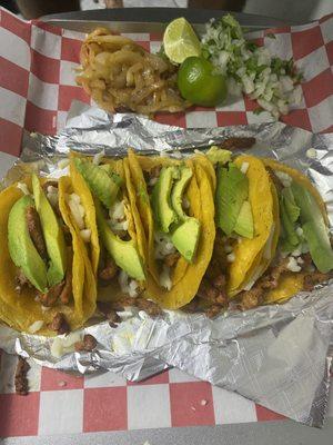 Asada mini tacos with cheese and avocado + beans