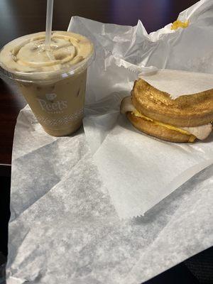 Iced coffee and breakfast sandwich