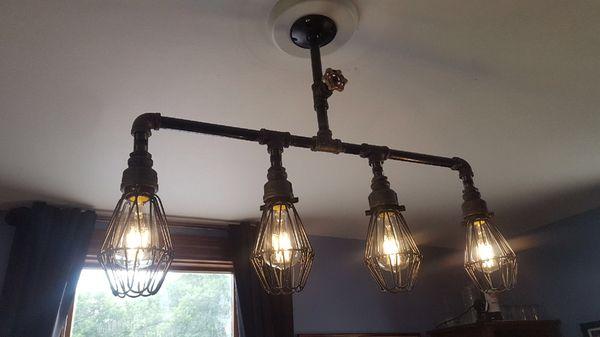 We hung a customers  custom made gas pipe chandelier in Rosedale Maryland.