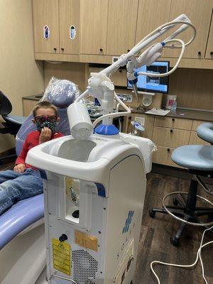 Getting ready for the laser procedure to get rid of a cavity