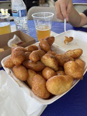 Fried donuts infused orange honey