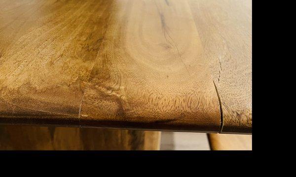 Anton Dining Table- cracked at seam where mango wood panels were glued together. West Elm did not acknowledge, help, or apologize.