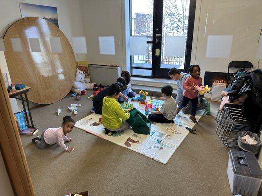 Safe space and enriching time for toddlers playing together and learning together.