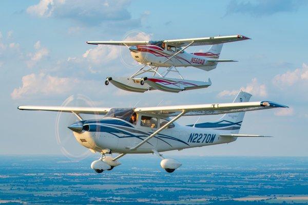 Two Van Bortel Cessnas Flying in Formation over Texas