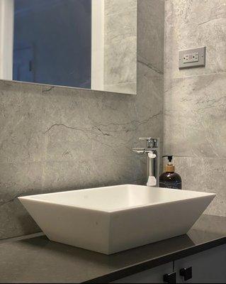 Bathroom renovation. Porcelain tile, quartz vanity top.