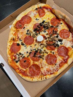 Pepperoni, Sausage, Black Olive and Mushroom.  I think they must have been running low on ingredients or something!!