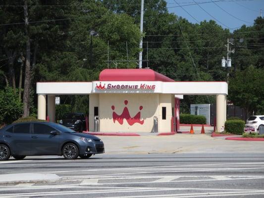 Storefront on Buford Highway near intersection with Clairmont Road. This Smoothie King has a drive-thru and used to be a Checkers.