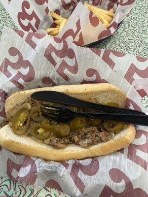 Cheesesteak note how skimpy the fillings are and how much bread there is vs ratio of meat and note how you can't see any cheese.